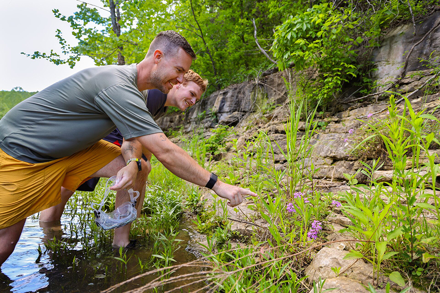 2025_DWC_Activities_CreekCrawlAdventure_Header_900x600 People exploring the creek at Dogwood Canyon
