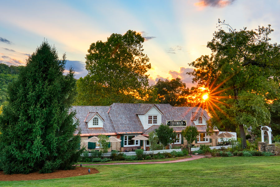 Exterior of Truman cafe with sunset in the background
