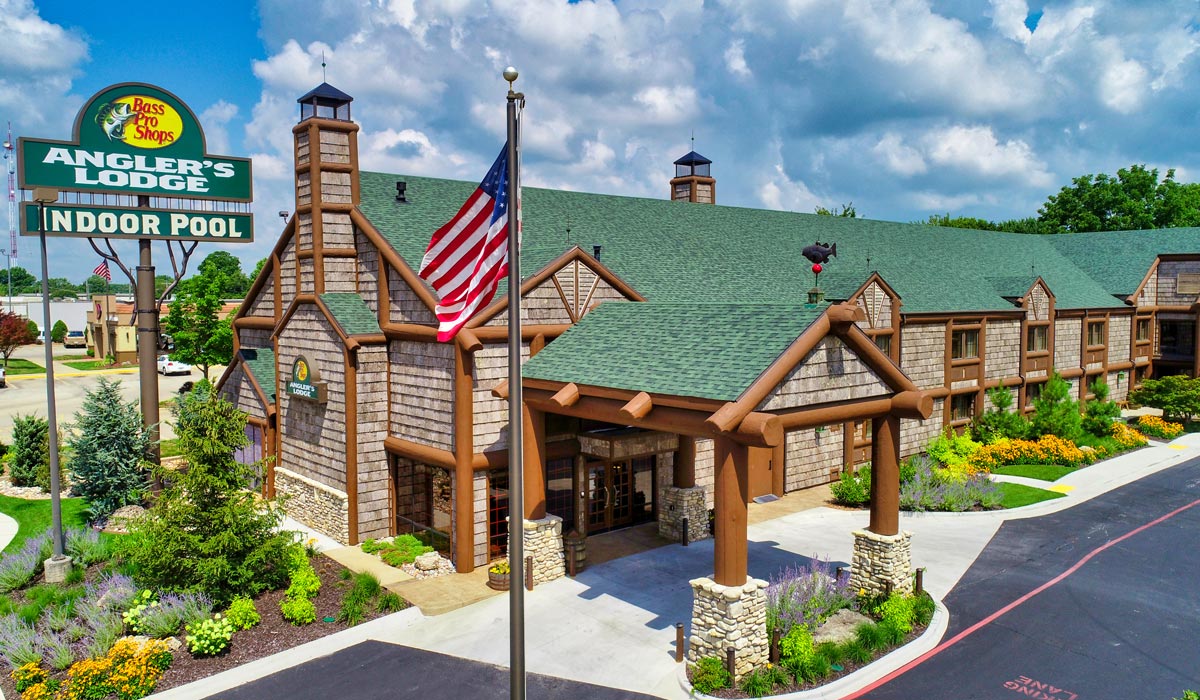 The exterior of Angler’s Lodge by Bass Pro Shops, featuring log-cabin.