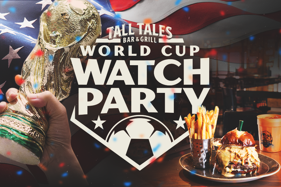 A World Cup trophy held up next to a burger and fries