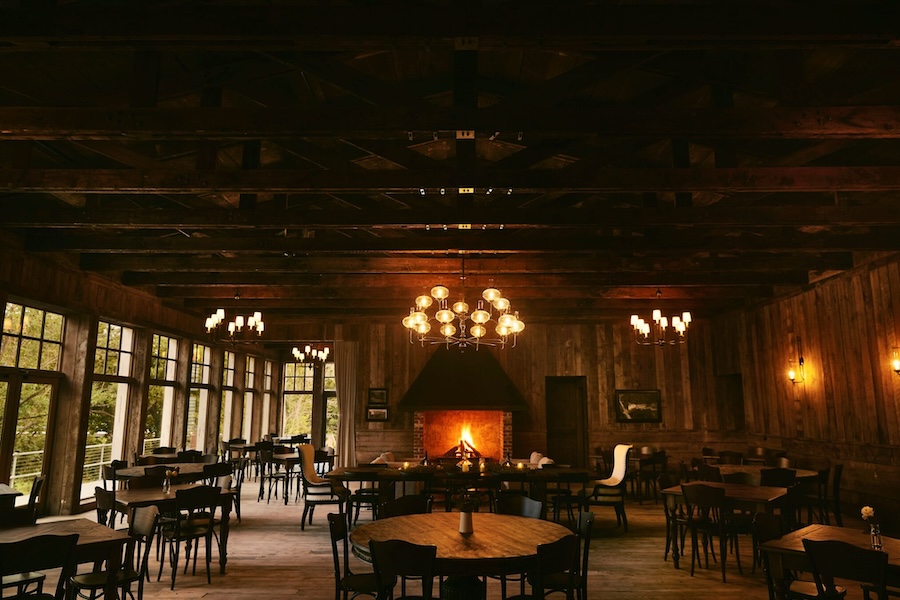 A dimly lit, wooden dining room at the Ozark Mill