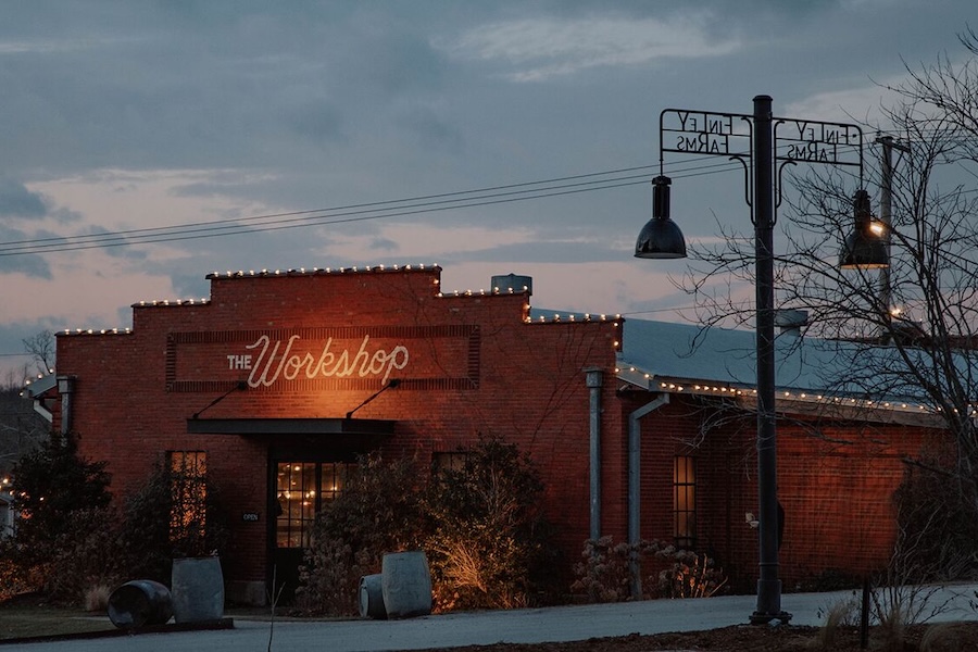 The Workshop coffee bar at Finley farms topped with snow and decorated with Christmas lights